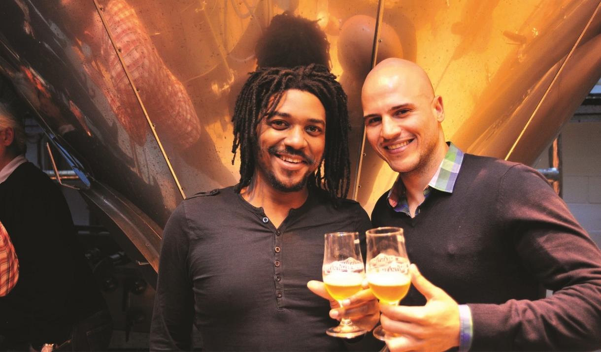 Two guys enjoy a sample of beer on a Meantime Brewery Tour in Greenwich.