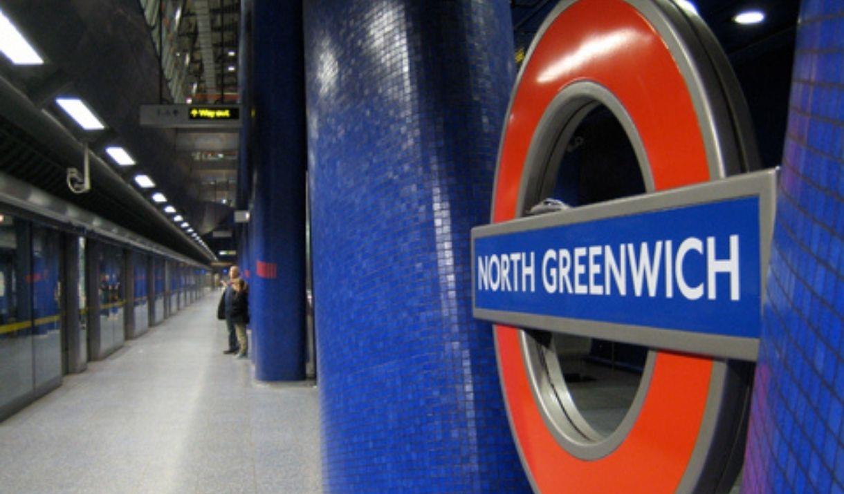 London Underground Sign in the foreground at North Greenwich Underground Station