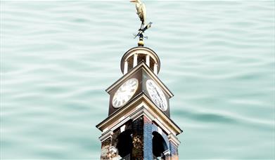 This beautifully restored Nelson’s Clock is hauled onto a barge in Deptford and sailed down the Thames