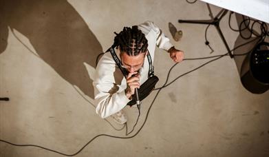 Celebrate the beauty of words and lyrics with an evening of mesmerising rap, spoken word and music