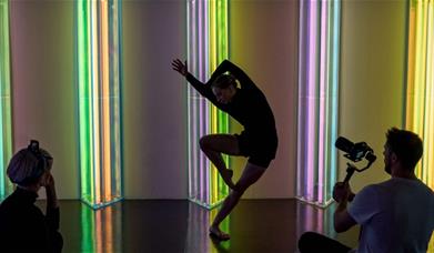 Choreographer Laura Amy White performing to bring Hundreds & Thousands to life through movement & dance.