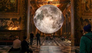 Luke Jerram’s awe-inspiring Museum of the Moon is displayed in the magnificent Painted Hall 