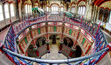 The upper floor of the Beam Engine House showing the beams and elaborate ironwork