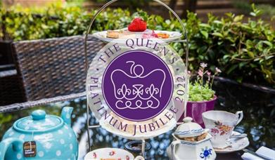Celebrate the Queen's Platinum Jubilee with your loved ones within the stunning Tudor Gallery