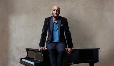A 19-piece NYJO band joined by national treasure Tommy Blaize to perform the unforgettable songs of Ray Charles