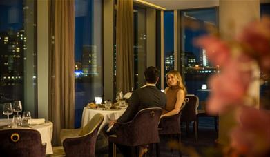 Kinaara, a stylish, fresh and fragrant contemporary Indian Fine Dining restaurant with views across the Canary Wharf Skyline and River Thames