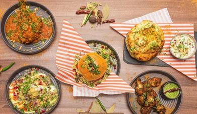 A Table filled with delicious looking food, all from the Yak and Yeti Restaurant in Eltham.
