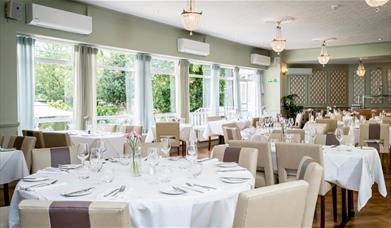 The Meridian Restaurant at The Clarendon Hotel overlooks the beautiful gardens.