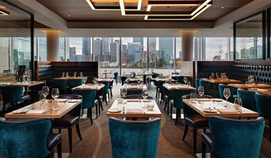 The luxurious interiors of the Market Brasserie at InterContinental London - The O2, overlooking Canary Wharf