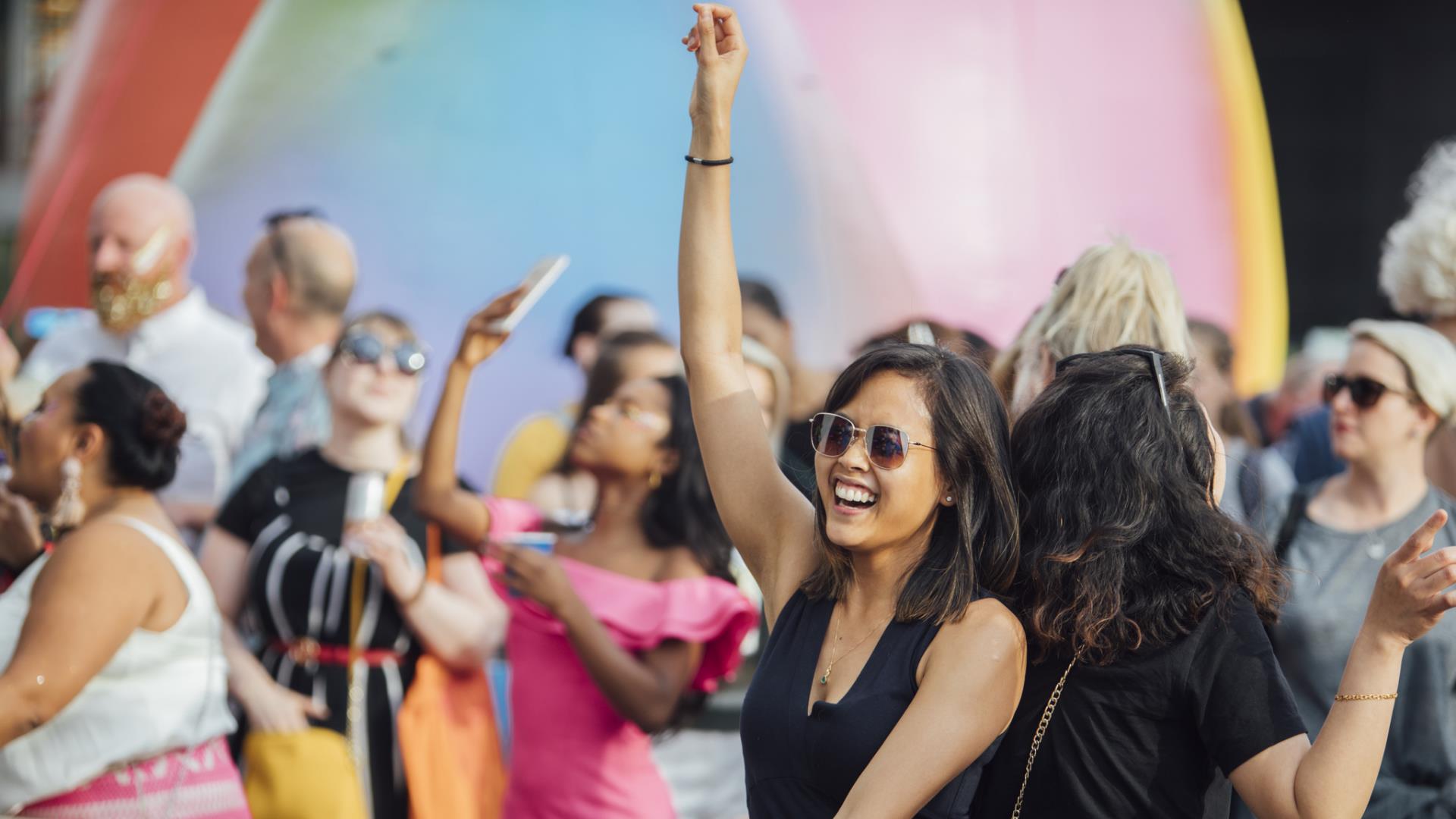 A woman dances at an event at The Tide on Greenwich Peninsula.