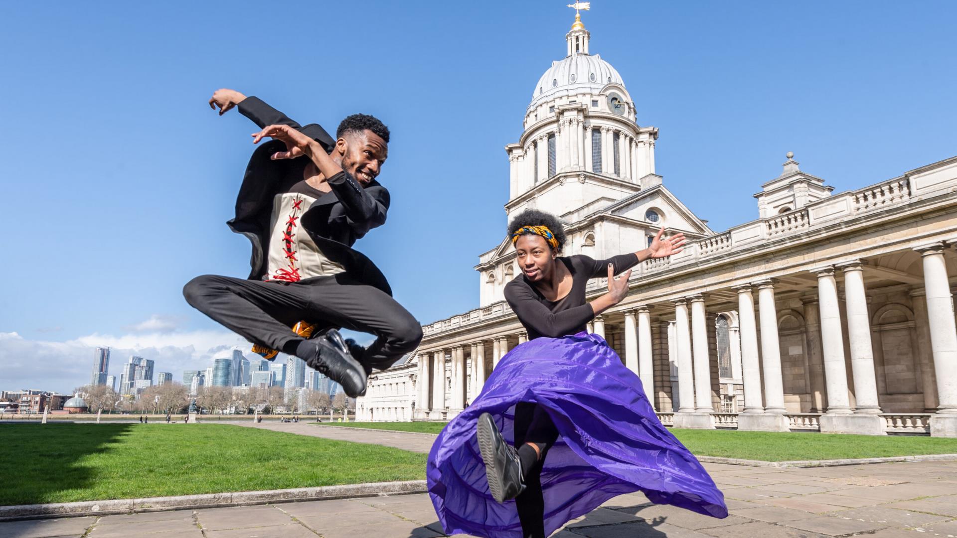 Two performers at Greenwich and Docklands International Festival in the grounds of the Old Royal Naval College in Greenwich.