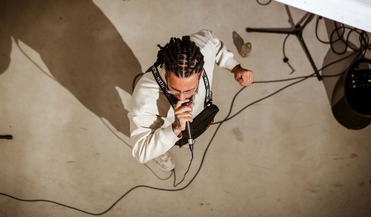 Celebrate the beauty of words and lyrics with an evening of mesmerising rap, spoken word and music