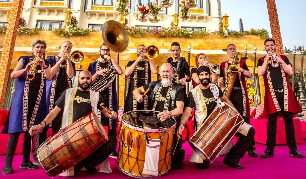 Have a go on the dhol drum and learn to play some funky grooves with drummers