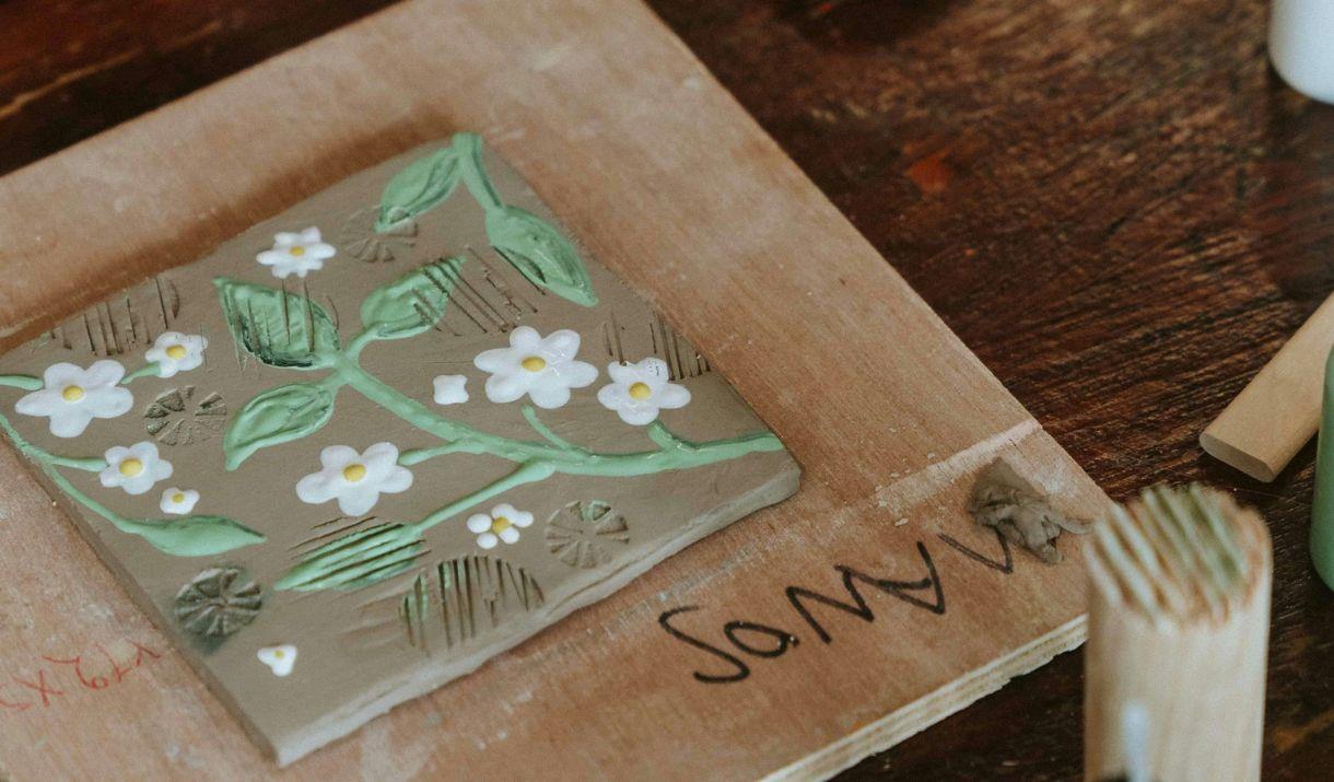 Ceramics workshop led by award-winning artist, Manos, focused on creating and designing your own ceramic tile