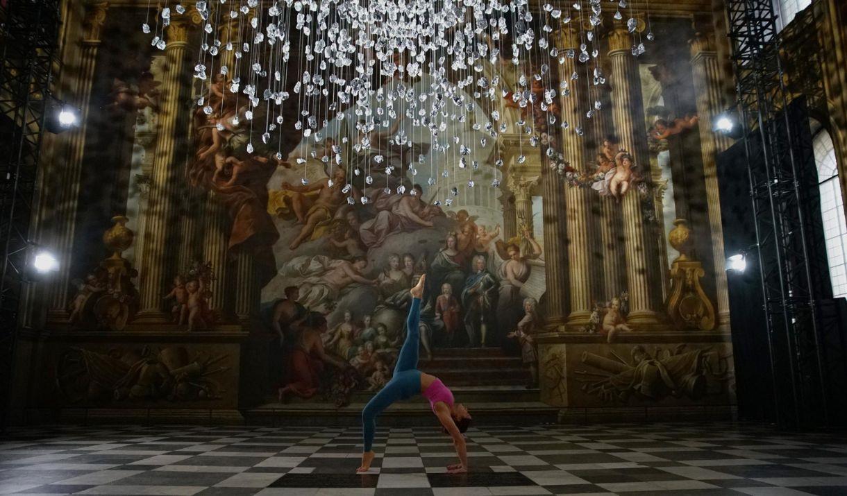 Let your mind and body be illuminated with an energising Mandala Vinyasa yoga practice in the calm serenity of the Painted Hall, featuring the stunnin