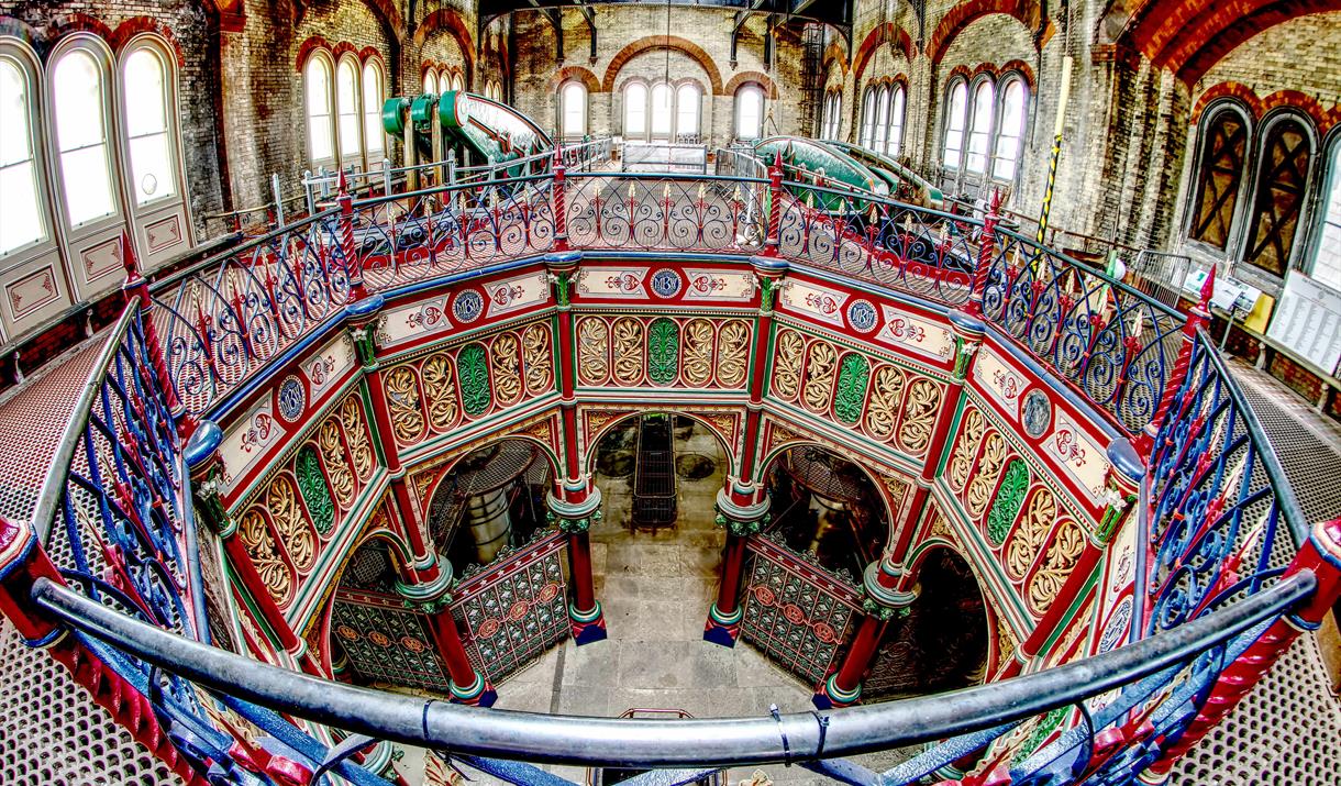 The upper floor of the Beam Engine House showing the beams and elaborate ironwork