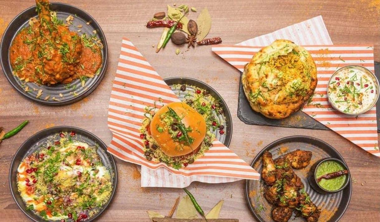 A Table filled with delicious looking food, all from the Yak and Yeti Restaurant in Eltham.
