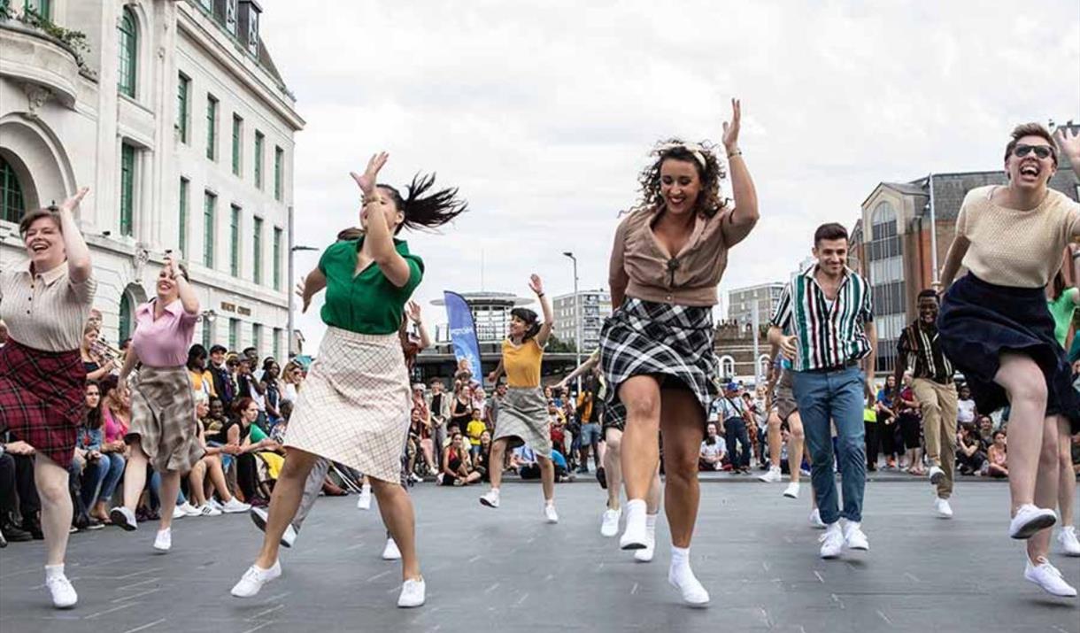 Everyday life transforms into an extraordinary celebration of community and dance