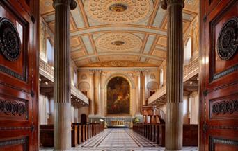 Brown doors and columns of the entrance to the Chapel, Old Royal Naval College