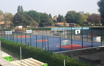 Hornfair Park basketball court with blue and red markings on the ground