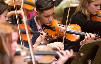 Students from Junior Trinity, the prestigious junior department of Trinity Laban Conservatoire of Music and Dance perform in Woolwich for the first ti