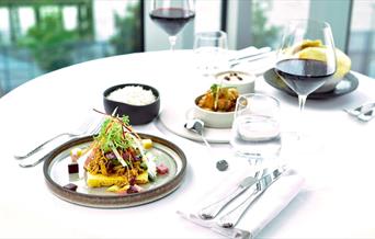 A stylish, fresh and fragrant contemporary Indian Fine Dining restaurant with views across the Canary Wharf Skyline and River Thames