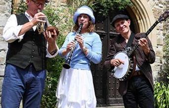Enjoy jazz music in the stunning surroundings of Eltham Palace and Gardens.