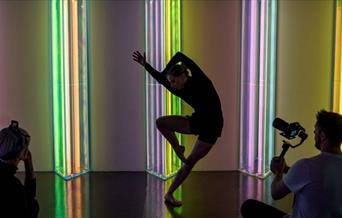 Choreographer Laura Amy White performing to bring Hundreds & Thousands to life through movement & dance.