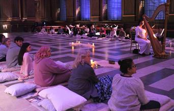 Soar high above the clouds with a blissful Tibetan bowls sound healing experience accompanied by live classical piano and violin music
