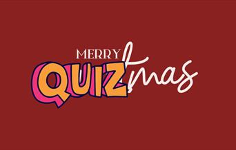A festive Christmas Special Edition Quiz set in the Visitors' Book Café, adorned with holiday decorations and cheer!