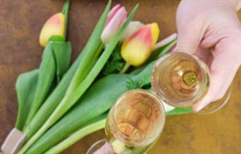 Celebrate Mother's Day with a delicious Sunday Roast and a glass of bubbly!