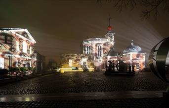 Royal Observatory buildings at night in white light