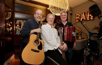Live entertainment by John Murphy, Kieran Boyle and John Walker, aka The Celtic Hearts