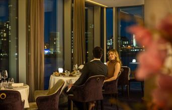 Kinaara, a stylish, fresh and fragrant contemporary Indian Fine Dining restaurant with views across the Canary Wharf Skyline and River Thames