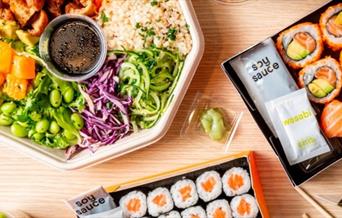 Wasabi Sushi & Bento's house specialities, a bowl of Chicken katsu salad and Chumaki set with salmon and avocado.