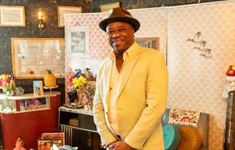 Join curator Tony Fairweather as he reads from his bestselling novel 'Twenty-Eight Pounds Ten Shillings: A Windrush Story'