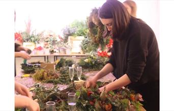 Make your very own wreath using fresh seasonal foliage, berries, dried fruits and flowers