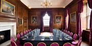 Purple chairs in U shape layout at the Admiral's House, Old Royal Naval College