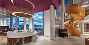 The modern lobby of Aloft London Excel in London's Docklands.