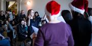 An evening of carols and songs performed by local choir, Hithertones