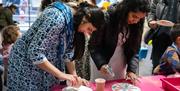 Discover the beauty and symbolism of traditional Rangoli art in this hands-on workshop, led by artist and storyteller Ekta Mody from Story Beyond Line
