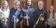 Hear the talents of wonderful FiveBy5 musicians playing trumpets