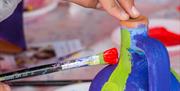Bring the kids for a fun and creative pottery painting session - perfect for all the family!