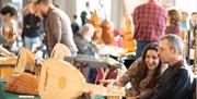 A vibrant marketplace where tradition meets innovation, offering exhibitors a unique opportunity to showcase their offerings to passionate enthusiasts