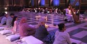 Soar high above the clouds with a blissful Tibetan bowls sound healing experience accompanied by live classical piano and violin music