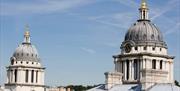 Image of two domes above Old Royal Naval College.