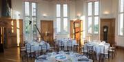 White banqueting round tables setup at the Octagon Room in Flamsteed House, Royal Observatory