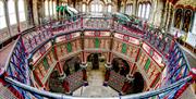 The upper floor of the Beam Engine House showing the beams and elaborate ironwork