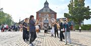 This Summer, come down to Woolwich Works for comedy, kids shows, art, food festivals, live music and more!