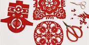 Try your hand at paper cutting, a delicate art form symbolising luck and happiness